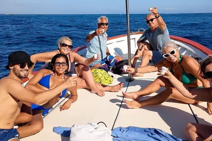 Scenic Capri Boat Tour: Sea Caves, Swimming, Snack and Limoncello