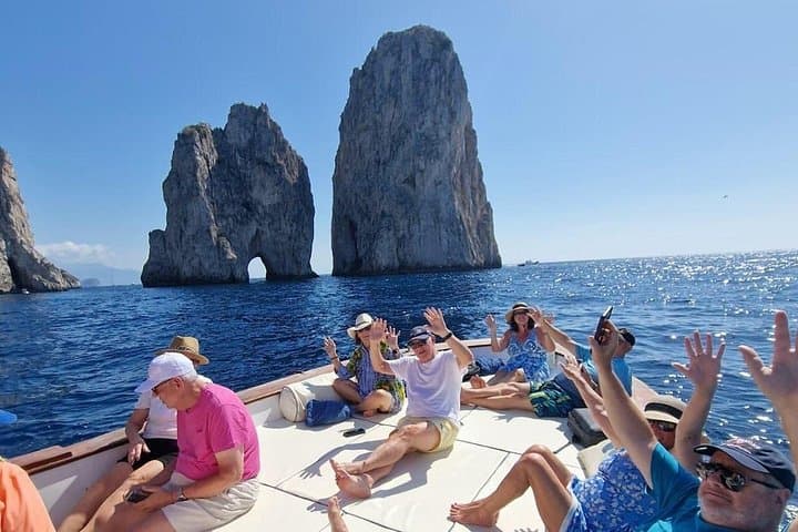 Scenic Capri Boat Tour: Sea Caves, Swimming, Snack and Limoncello