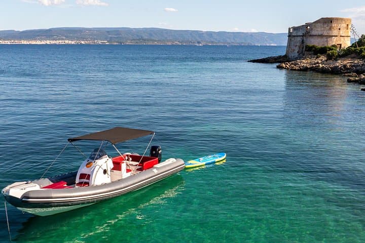 Boat tour with snorkeling and small aperitif in Alghero