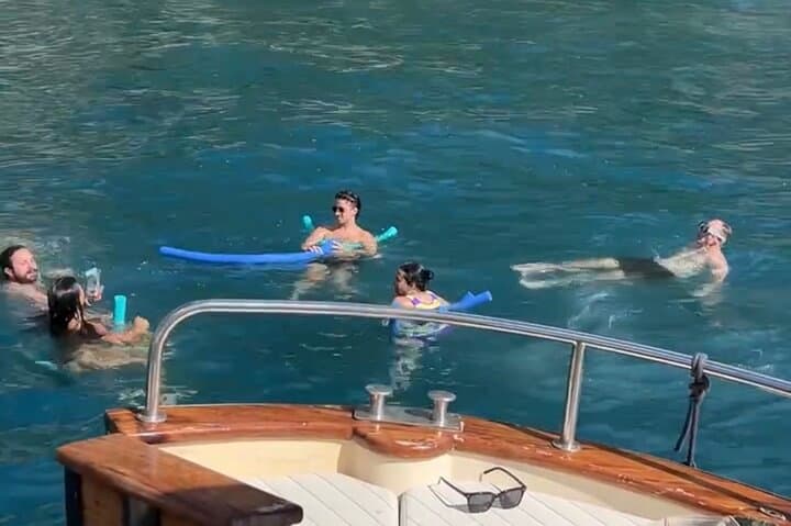 From Naples Boat trip to Capri visit to the city swim stop