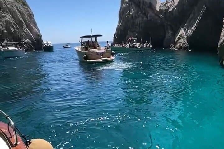 From Naples Boat trip to Capri visit to the city swim stop