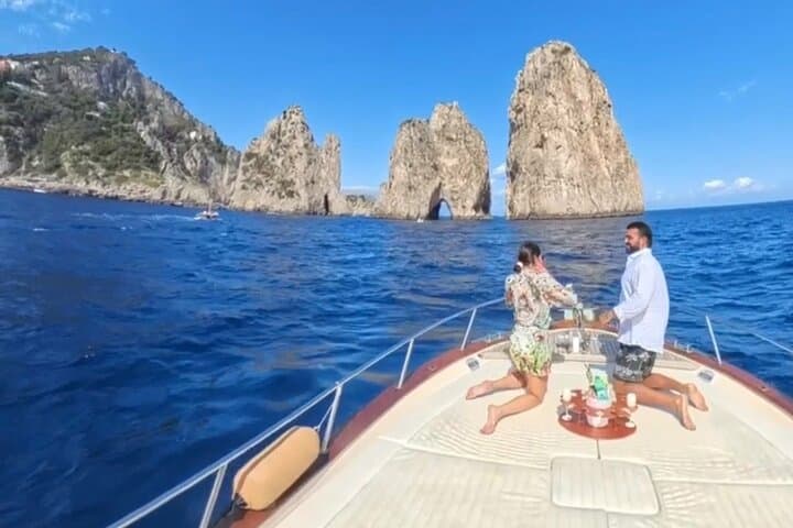 From Naples Boat trip to Capri visit to the city swim stop