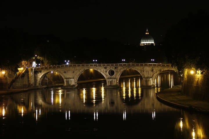 Sixtine Bridge, 15th C. AD, and St. Peteer Michelangelo's dome at night, from Garibaldi Bridge, Trastevere, Rome, Italy Rome