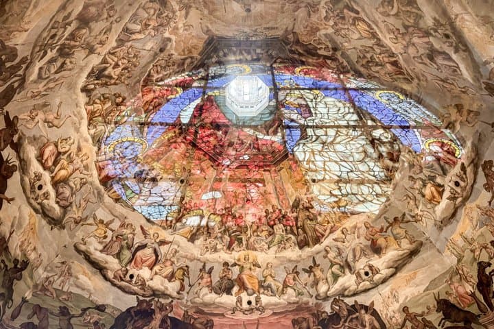 Marvel at the Last Judgment frescoes - the reflection of the stained glass windows transform the space into a moment unlike any other..