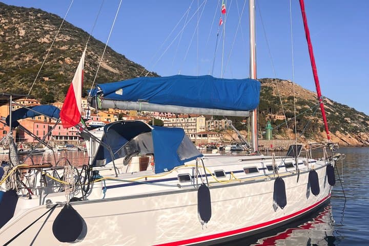 Golfo Aranci tour 3h private sailboat dolphins and aperitif