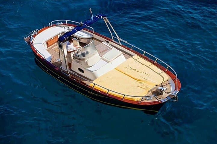 Sunset boat tour among Capri's hidden treasures