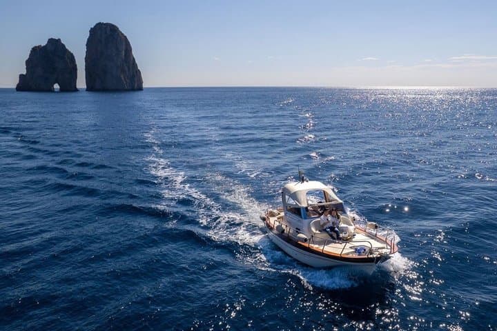 Three Hour Private Guided Tour of Capri with a luxury Gozzo cabin cruiser