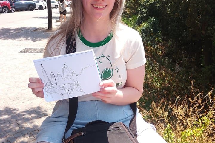 Sketching of the view over Rome from Pincio terrace with Guido