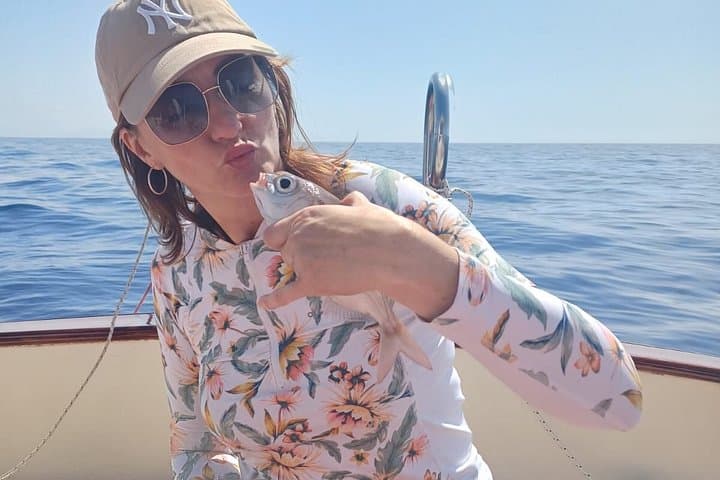 Shared trip with fishing and visit the beauty of Capri island