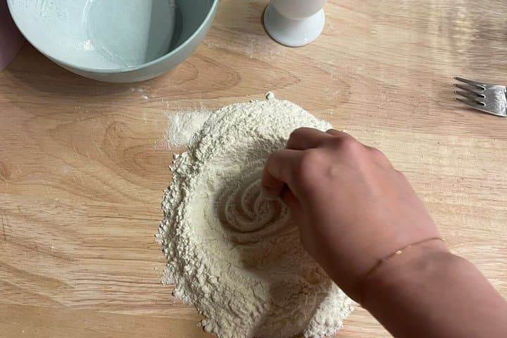 Fresh pasta cooking class with wine tasting