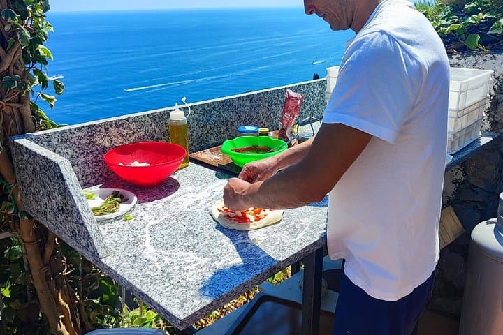 Pizza class overlooking the sea of Amalfi