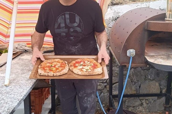 Pizza class overlooking the sea of Amalfi