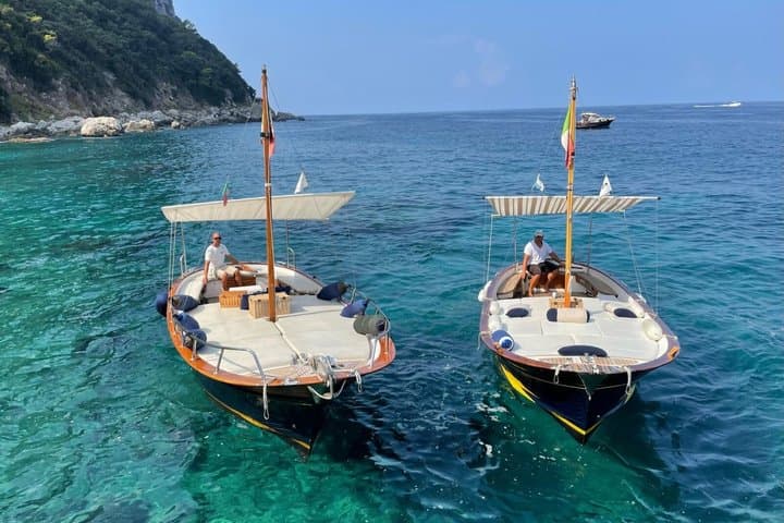 Private Capri Boat Tour: Blue Grotto, Faraglioni, & Swim Stops
