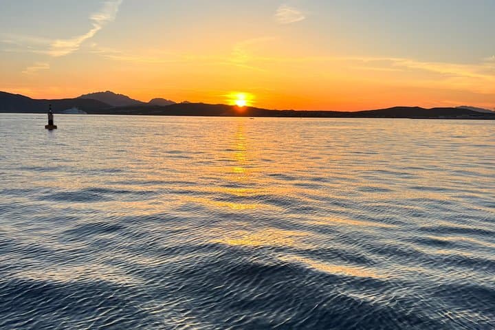 Golfo Aranci tour 3h private sailboat dolphins and aperitif