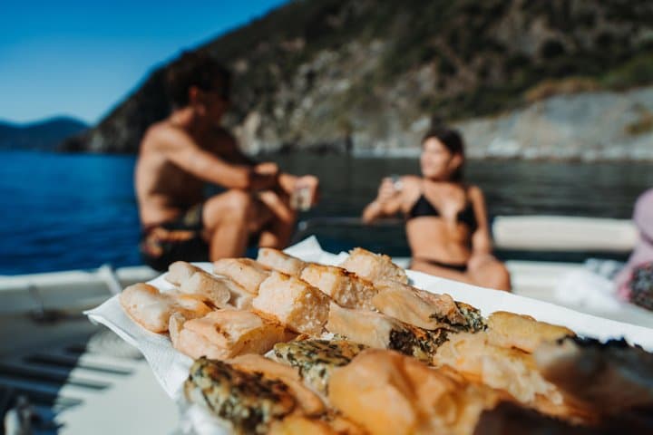 Cinque Terre Sunset Boat Tour Experience with Aperitivo and Swim