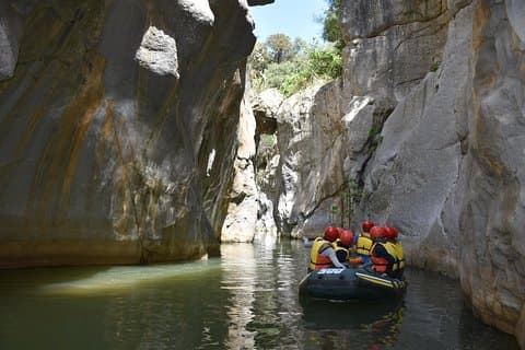 in a rubber dinghy inside the big gorge