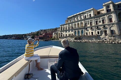 Boat experience along the coast of Naples and breathtaking views.