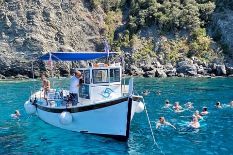 Cinque Terre daytime boat tour with a traditional ligurian gozzo