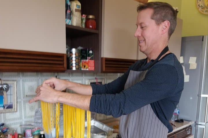 fresh egg noodles on the pasta dryer
