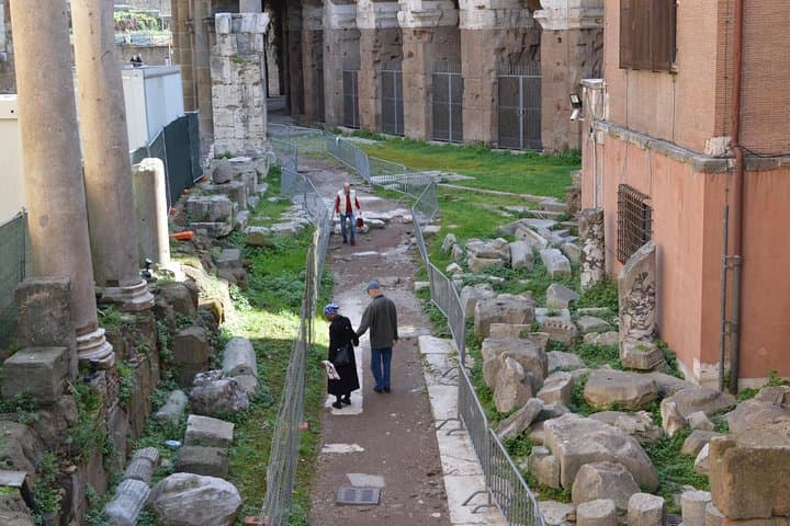 Walk through the ruins of an ancient theater.