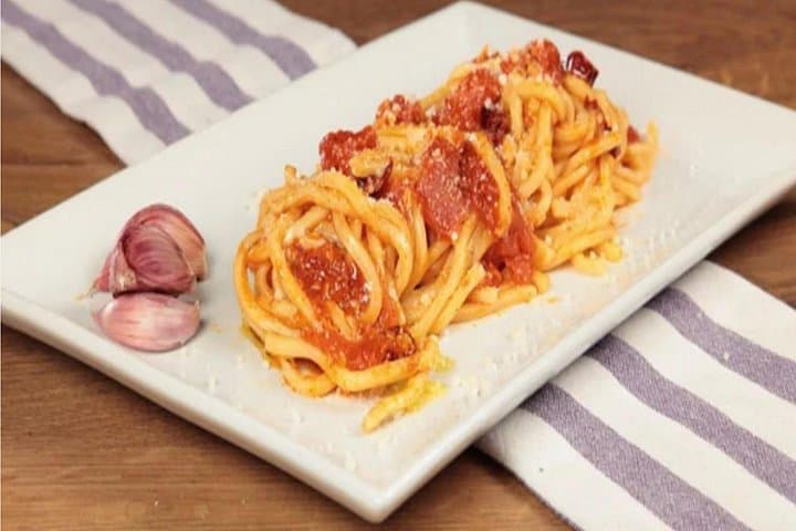 Handmade past with tomato and giant garlic