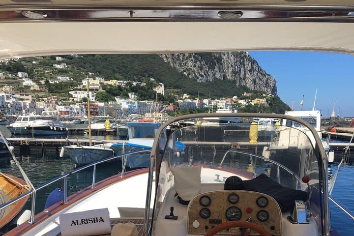 Exclusive Boat Tour from Capri with Swim Stop and Aperitif