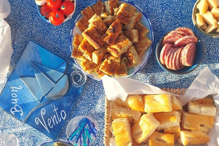 Cinque Terre daytime boat tour with a traditional ligurian gozzo