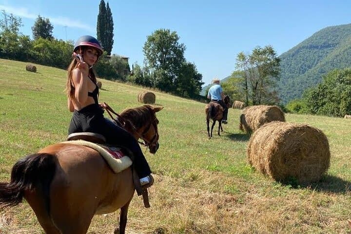 Horseback ride and gourmet cuisine in a historic food shop