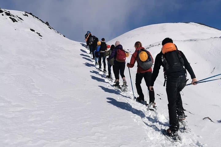 Hike near the summit craters up to the maximum safe altitude currently foreseen