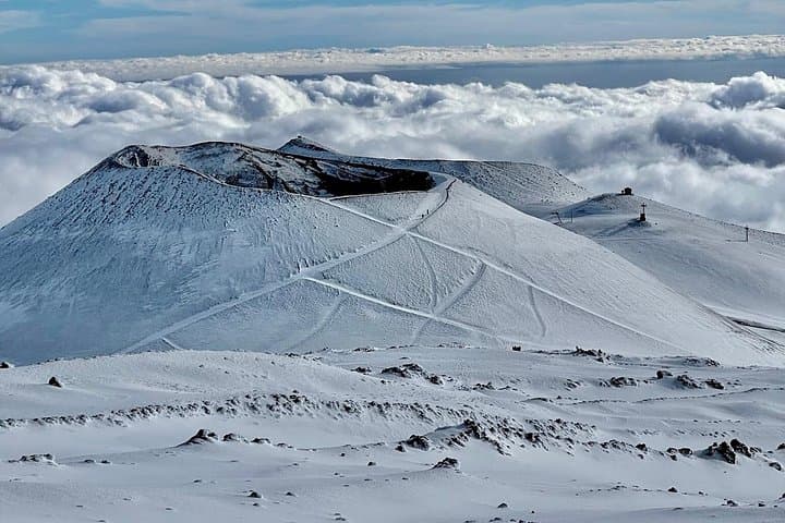 Hike near the summit craters up to the maximum safe altitude currently foreseen