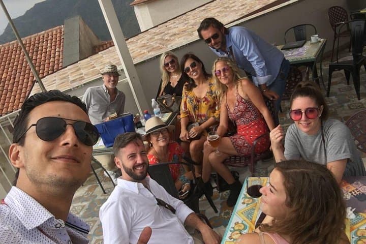 A smile and a few drinks in the village of Taormina with this very nice group!