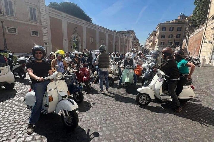 Ride Rome on a Vespa with a local driver