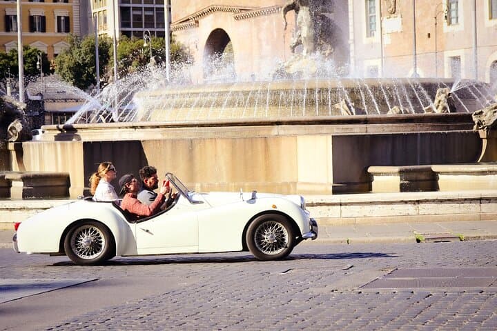 Driving at Piazza della Repubblica in front the beautiful Fountain of Naiadi