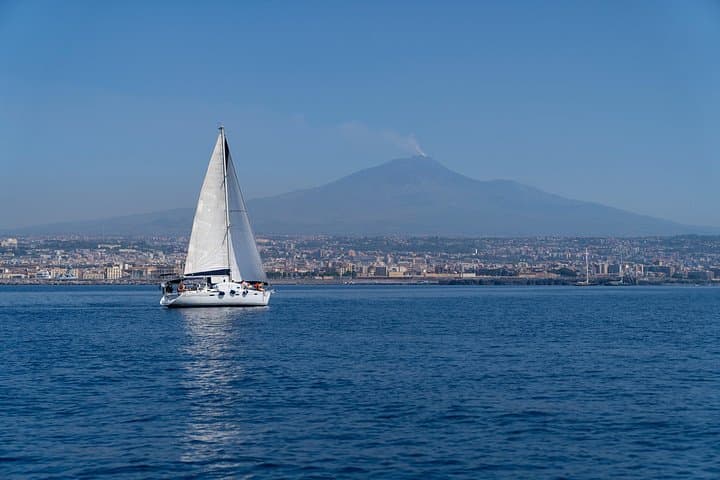 Catania boat tour along the coast with aperitif and snorkeling