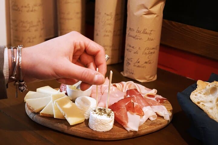 Pair wine a selection of local cheese and ham from Piedmont