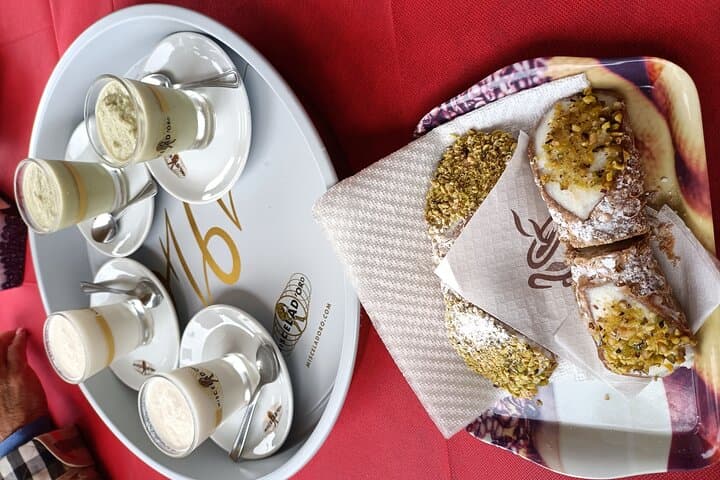 Tour from Messina, Taormina and savoca test cannoli and granita