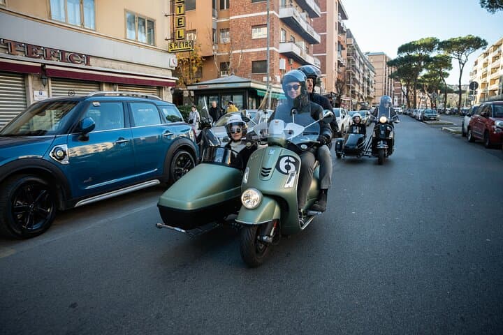 Enjoy a scenic Vespa ride through the heart of the city