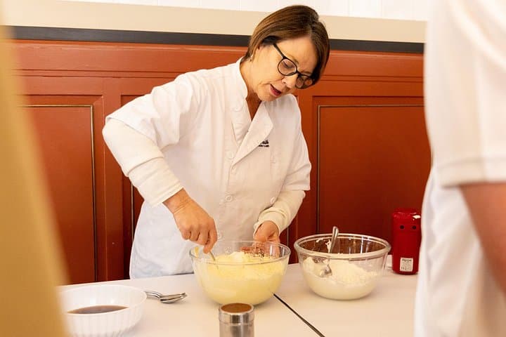 Learning authentic tiramisù-making techniques with our chef.