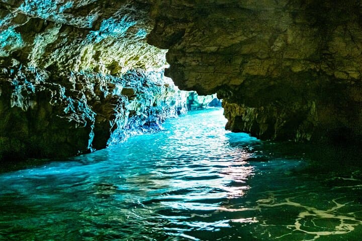 The Palazzese Cave is a beautiful natural cavity in Polignano a Mare, where an elegant restaurant overlooks a turquoise sea. The rock faces create a unique romantic and suggestive atmosphere