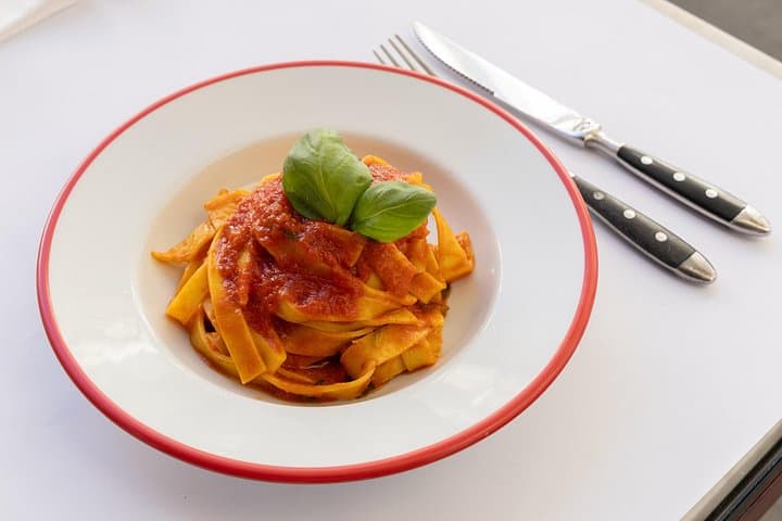Hand made fettuccine with tomato and basil sauce