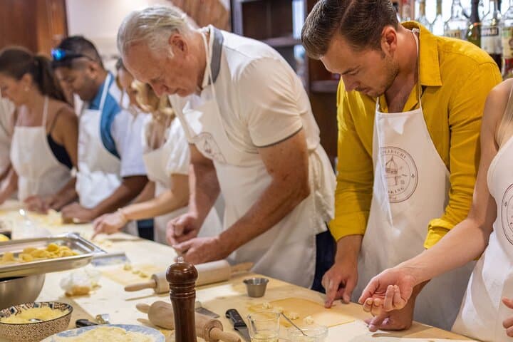 Florence: Flambé Cheese Wheel Truffle Pasta Class & Tiramisù