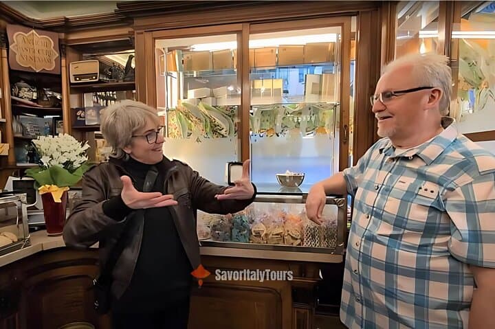 Guide introduces the owner and history of this wonderful family owned pastry shop to customer. Food and wine tour in Venice