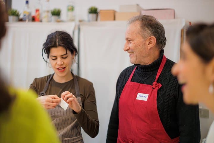 International aperitif + cooking class in Italian