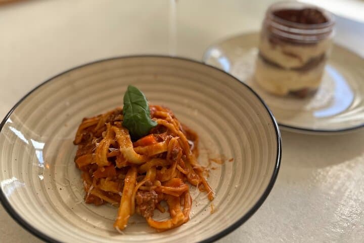 Homemade spaghetti ragu and tiramisu
