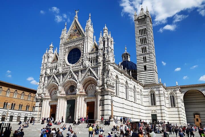 Enjoy free time in Siena, opt to visit its beautiful cathedral at own expense