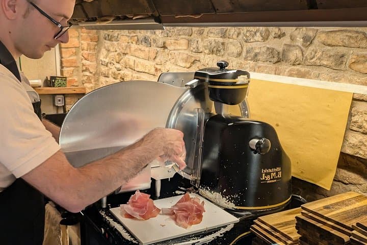 Taste Parma ham with local fried bread