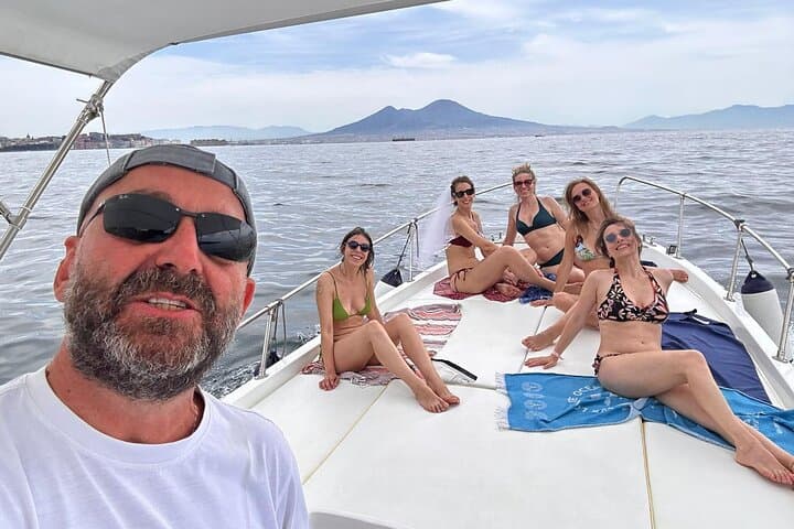 Naples Coastal Paradise: Boat Tour with Swim, Music & Hidden Gems