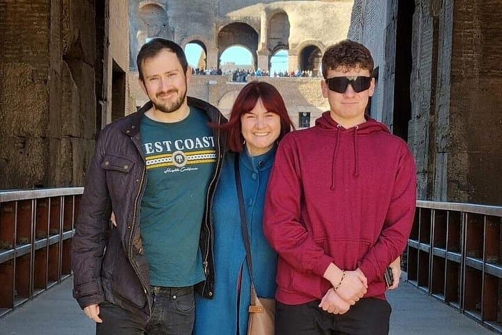 Happy family taking photos at gladiators gate with Dream Tourism