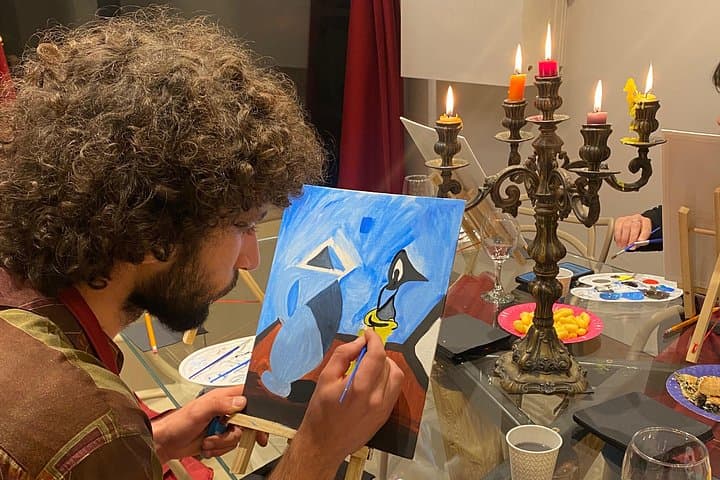 Giovanni guiding participants step-by-step, helping everyone bring their artistic ideas to life