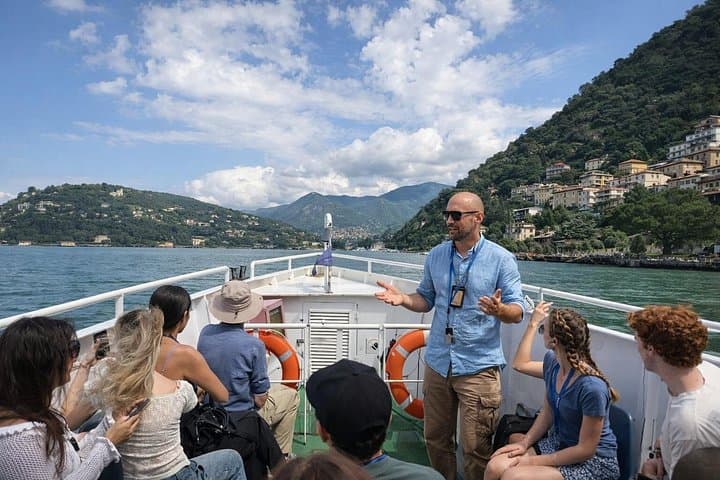 A licensed local guide explaining Lake Como during a small-group Como & Lugano tour